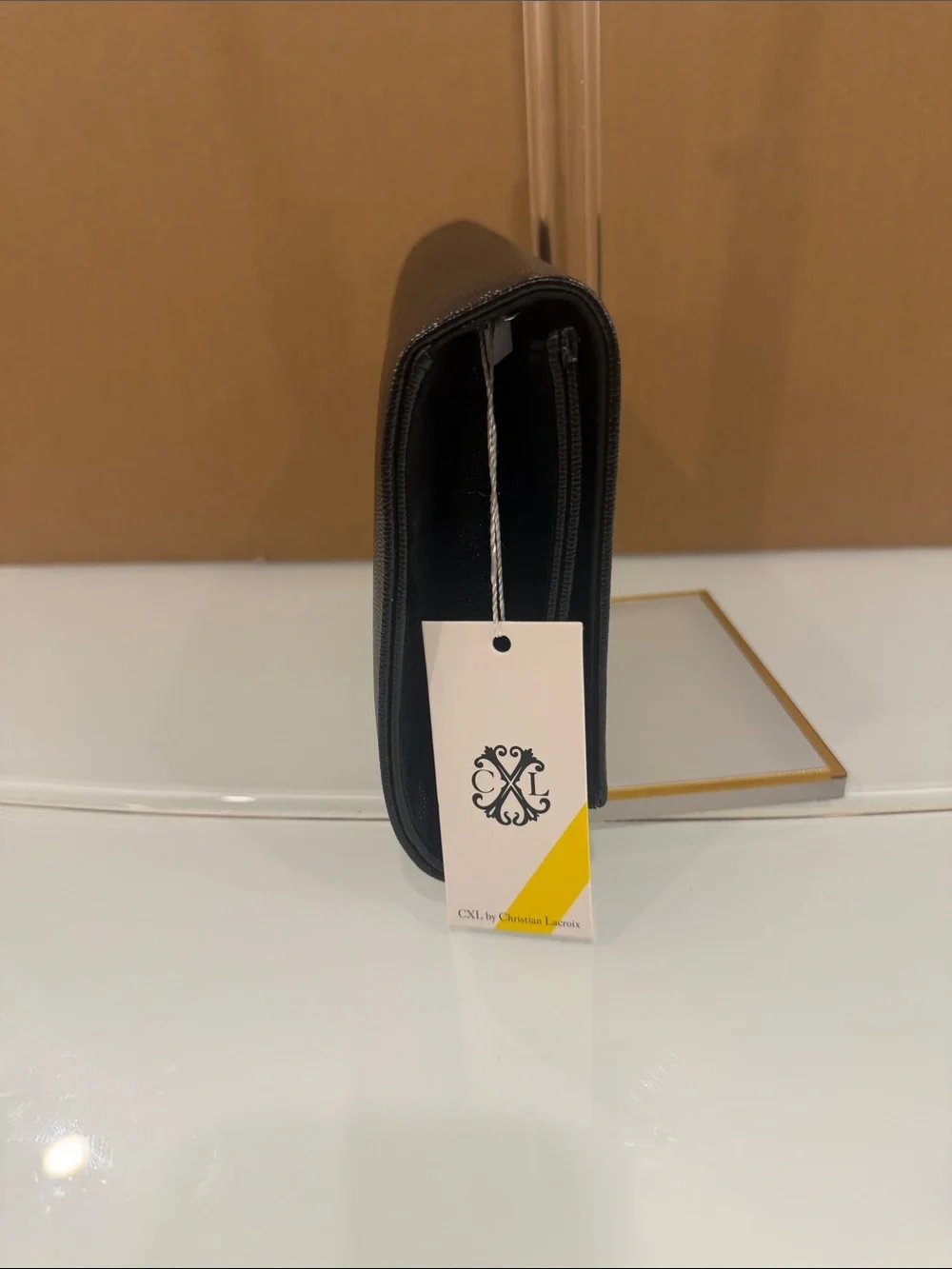 Black Leather Crossbody Bag with Gold Logo Accent